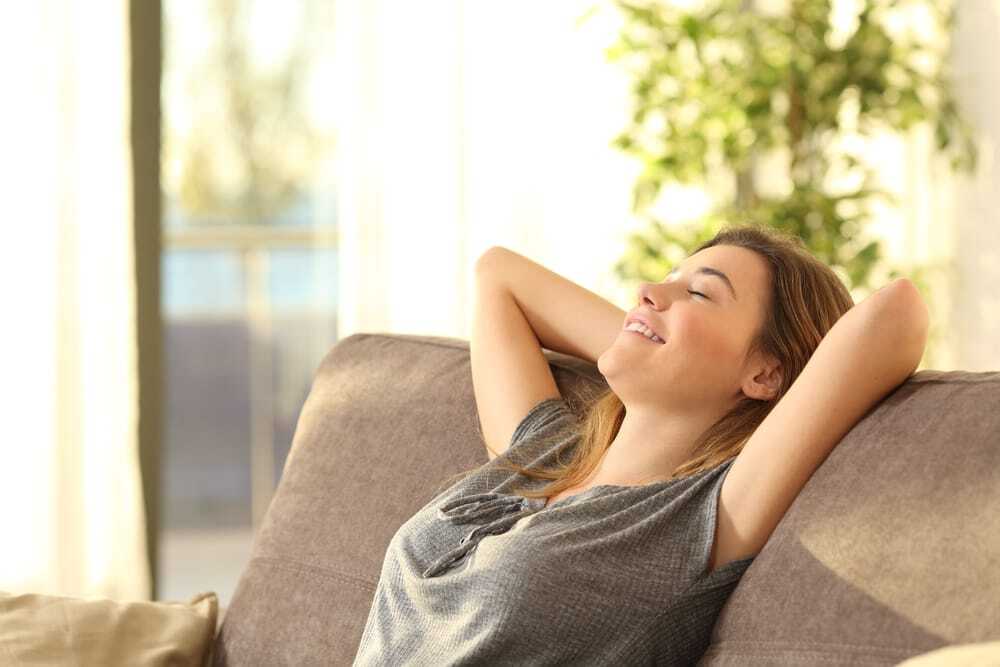 Portrait,Of,A,Girl,Relaxing,On,A,Sofa,After,Work